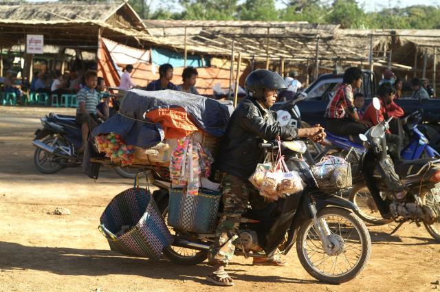 “It’s not our nature to go out at night and sit at teashops or beer stations. We stay home at night and only go out if there are any matters to attend to. Our fun time is during pagoda festivals, and at those times we go out at night and visit around.” Shop owner 
